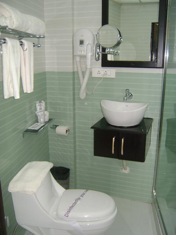 Gago Inn Thiruvananthapuram Szoba fotó